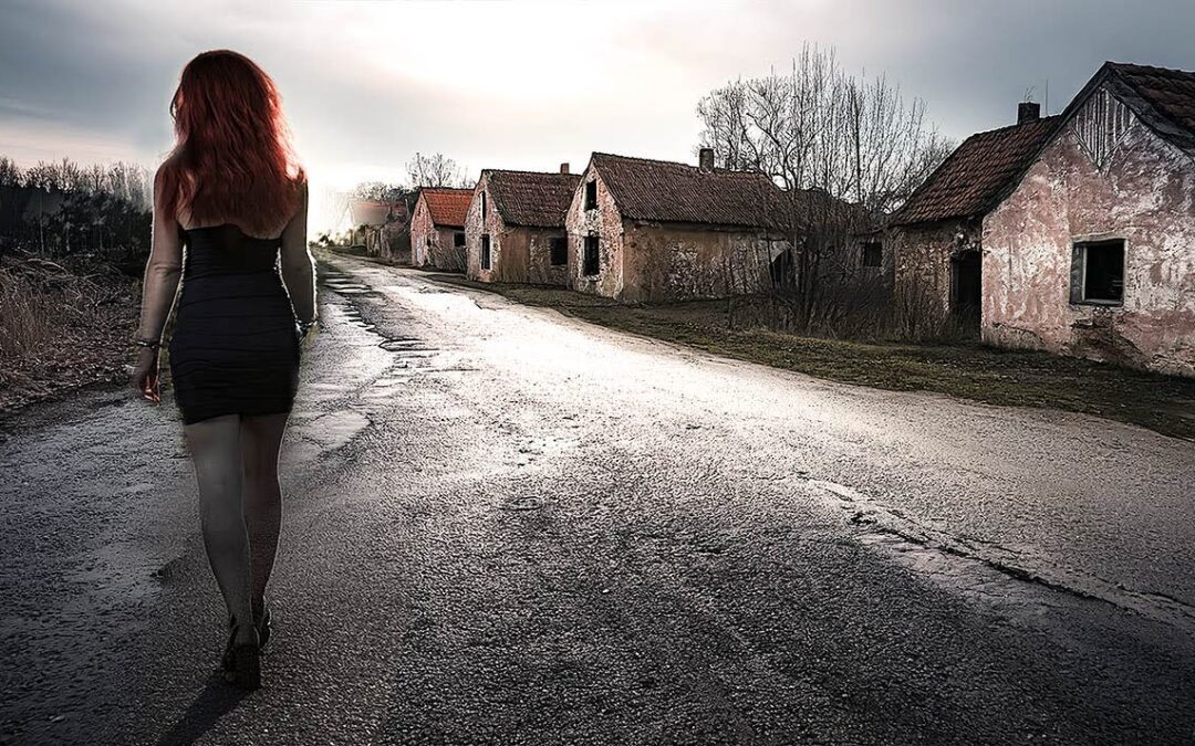 Roter Faden auf grauem Asphalt